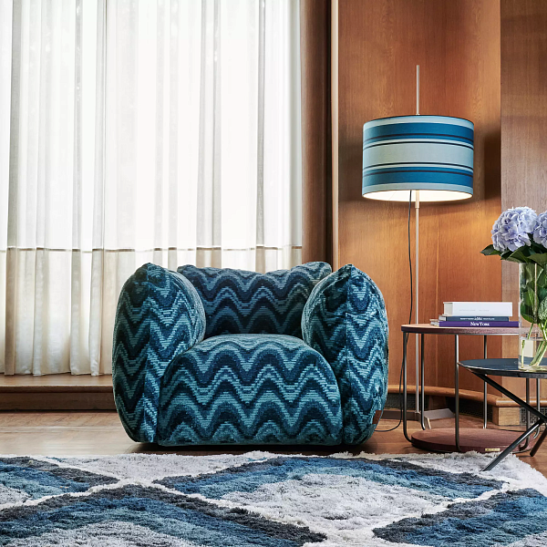 9374-EtroHomeInteriors_DivingIntoPatterns_CushyBlueArmchair.jpg