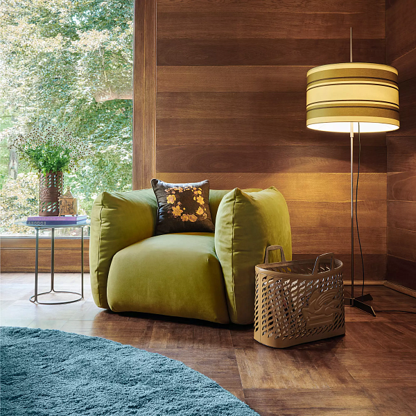9372-EtroHomeInteriors_DivingIntoPatterns_CushyGreenArmchair.jpg